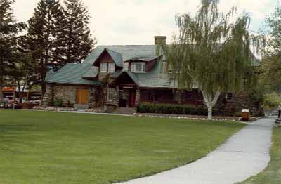 General view of the Information Centre, showing the shingled roof, 1988. (© Photo courtesy of Mark Kolasinski, Jasper National Park of Canada / Parc national du Canada Jasper, 1988.)