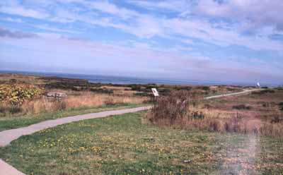 General view showing the location on an isolated, extreme easterly point of land overlooking the Atlantic Ocean. © Parks Canada Agency / Agence Parcs Canada