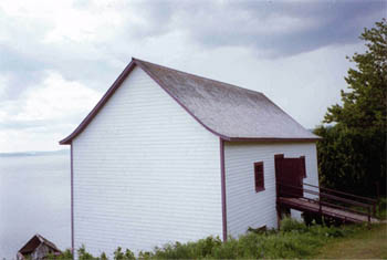 Southern view of the Hyman Warehouse, 1992. © Parks Canada Agency / Agence Parcs Canada