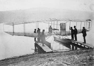 John A.D. McCurdy in 'June Bug' aircraft of the Aerial Experimental Association. © Expired; Credit: J.H. Parkin / Library and Archives Canada / C-003191