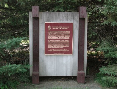 Photo of plaque for Fight at the Long-Sault, Chute-à-Blondeau, ON © Parks Canada Agency / Agence Parcs Canada, 1989