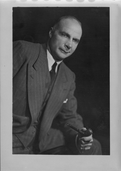 Lionel Conacher, MP for Trinity Toronto. 1948 (© Arthur Roy / Library and Archives Canada | Bibliothèque et Archives Canada / PA-047102)