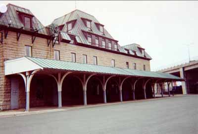 General view of the rear elevation of the Newfoundland Railway Headquarters National Historic Site of Canada terminus building, 1997. © Public Works and Government Services Canada / Travaux publics et Services gouvernementaux Canada, 1997.