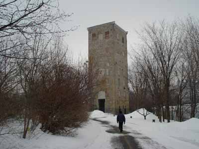 Corner view of the E.B. Eddy Digester Tower, showing the exterior walls of solid limestone masonry, 2009. © Parks Canada Agency / Agence Parcs Canada, Jamie Dunn, 2009.