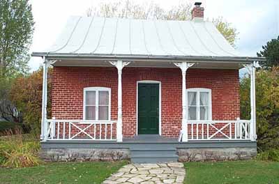 General view of the Sir Wilfrid Laurier National Historic Site of Canada, showing the main façade, 2003. © Parks Canada | Parcs Canada, 2003