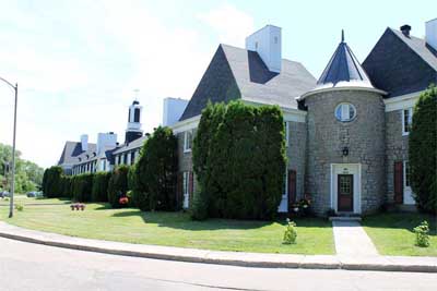 L’immeuble à appartements Britanny Row, en pierre © Parks Canada | Parcs Canada